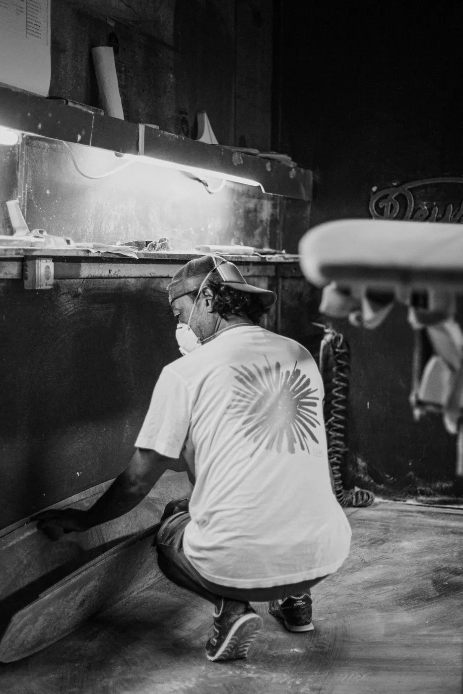 Back view of the shaper at the workshop, black and white