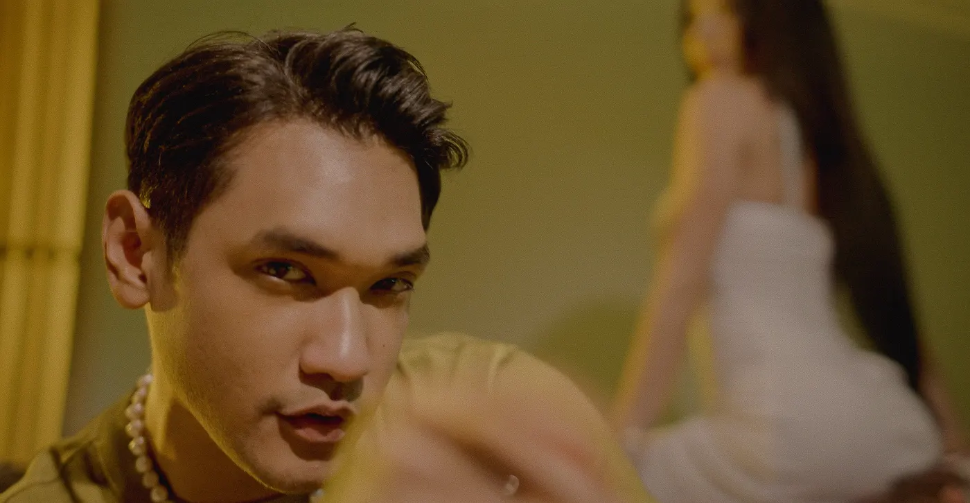 Close portrait of Afgan with a yellow blur in the foreground